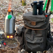 Use the base support under the fire base to prevent the ground beneath from scorching/burning.  Leave no trace!